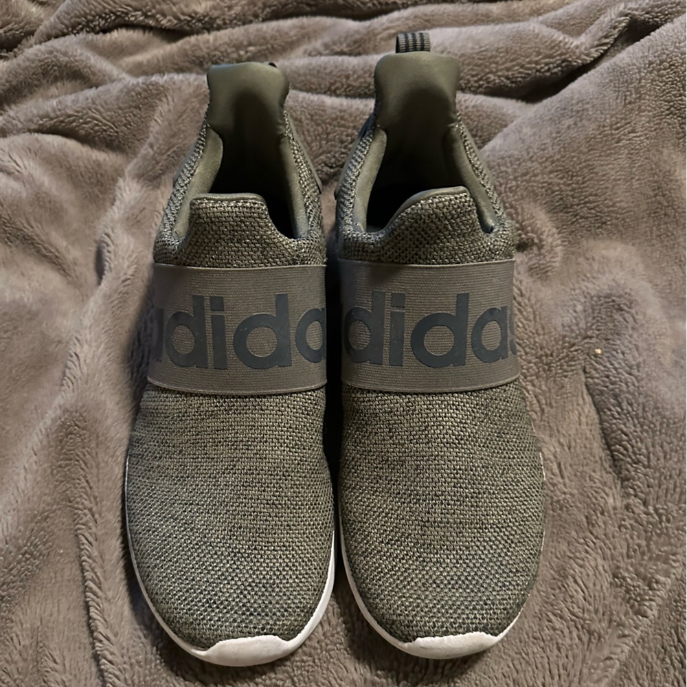 Men’s adidas slip ons. Size 9.5. Worn but still in great shape!